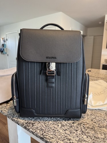 Rimowa never still black - rimowa,