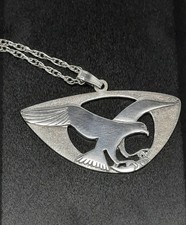 STERLING SILVER PENDANT OF AN