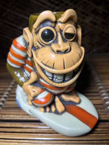 Surfing monkey chango tiki - surfing,