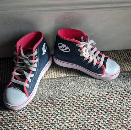 Pair heelys roller shoes - of,
