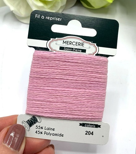 Darning wool visible - , mending