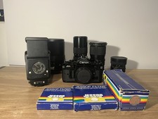 Canon A-1 with lenses and lots