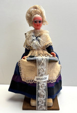Vintage Lady doll working on