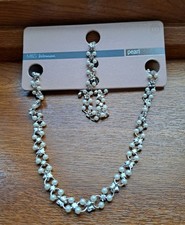 Marks and Spencer Woman Pearl