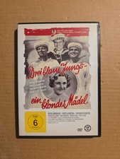 Drei blaue Jungs ein blondes