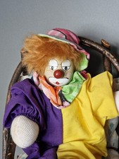 Haunted Doll Fred, young adult man, active, positive. clown style doll.