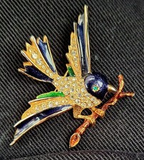 SPHINX BIRD ON A BRANCH VINTAGE BROOCH