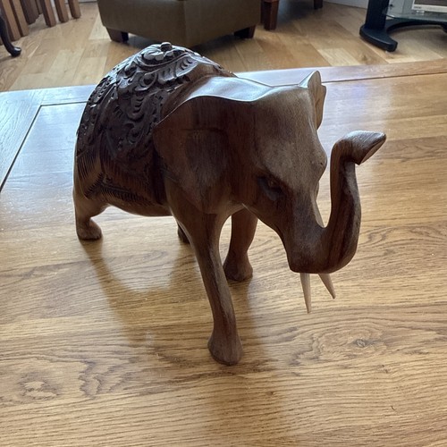 Hand carved wooden elephant - hand,