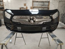 Mercedes V/W177 Front Bumper Cosmos Black 191,light Damage, Needs Paint.