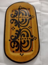 Shallow pottery dish,brown