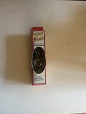 The Original American Hand Crafted All Metal Kazoo" in its packaging
