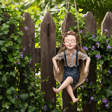 20cm Boy on Walnut Swing Resin