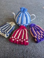 Handmade knitted tea cosy -