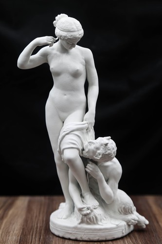 Satyr and nymph statue - and,