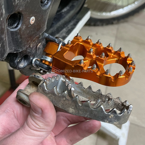 Orange foot pegs - orange,