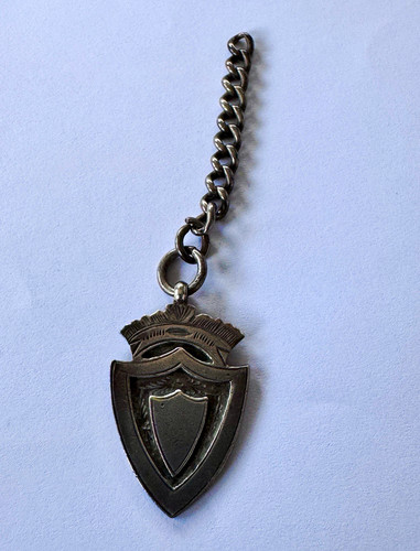 Antique 1912 silver shield - c,