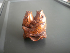 Hand carved wood netsuke fish - hand,