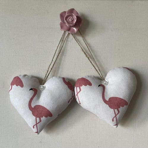 Pair cushioned heart door - of,