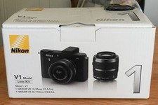 Nikon 1 V1 + 10-30mm + 30-110mm Twin Zoom Kit + SB-N5 Flash + GR-N1000 Grip