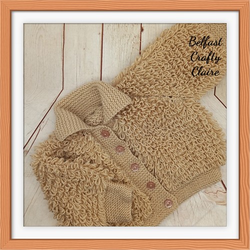 Hand knitted baby loopy - hand,