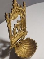 The Gothic-style baptismal