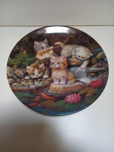 Two signed collectors plates - two,