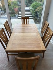 Solid Oak Extendable Dining Table With Feature Leg - Seats 8
