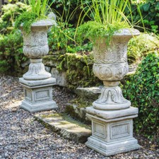 Pair of Large Victorian Style Stone Cast Urns with Plinths