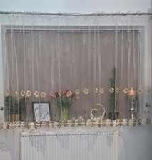 Voile net curtain with flowers