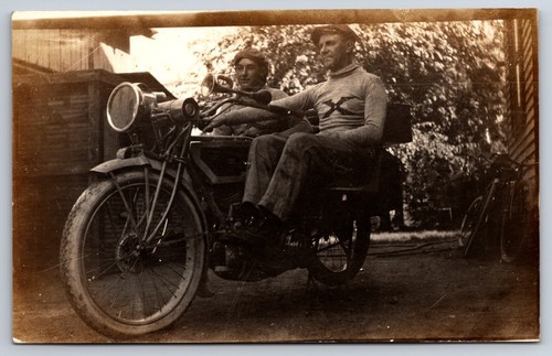 Two men motorcycle with - two,