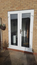 WHITE UPVC FRENCH DOORS OPEN