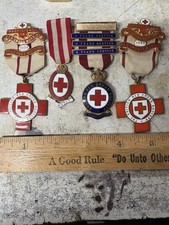 FOUR 1930s RED CROSS MEDALS AND BARS AND RIBBONS