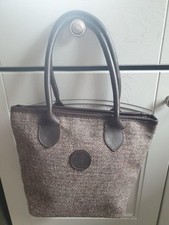 THE HERDWICK COMPANY - RYDAL SMIT MARK TWEED BAG.