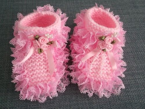 Hand knitted baby - hand,