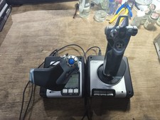 A Pair Of Saitek X52 Throttle