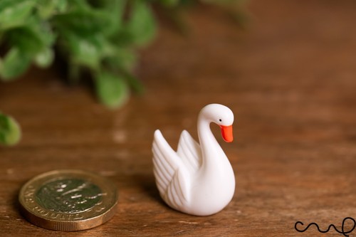 Plastic white swan - x,
