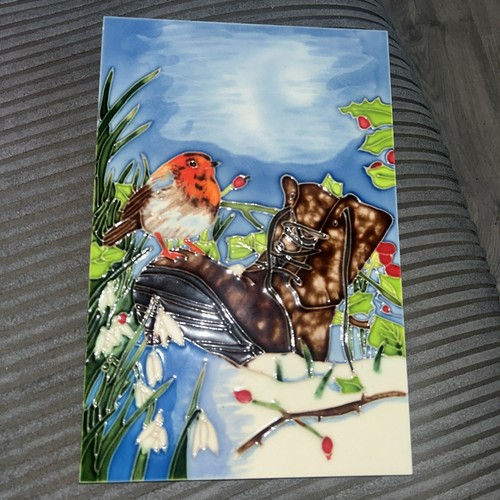 Glazed tile robin on a - on,