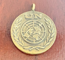 Vintage UN Peacekeeping Medal – “In Service of Peace” United Nations Collectable