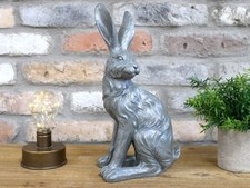 Textured silver sitting - silver, hare