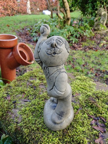 Stone garden cricket player - stone,