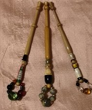 Trio of hand painted character lace bobbins with spangles