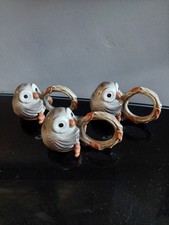 Three Fitz and Floyd ceramic owl napkin rings.