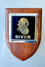 Steel Badge, Siebe Gorman type Helmet printed on badge, mounted on hard wood 