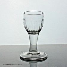 Georgian plain stem dram glass, flute-moulded ovoid bowl