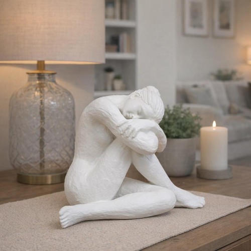 White sitting woman sculpture - woman,