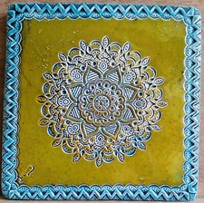 Decorated relief-moulded