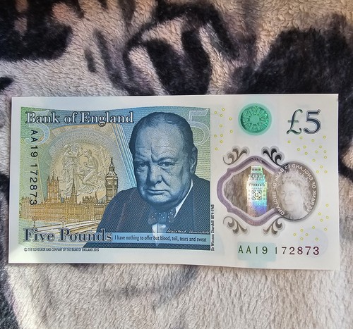 New polymer five pound - £5,
