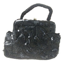 Vintage beautiful black sequined and beaded evening bag with beaded handle.