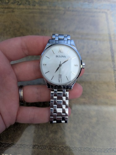 Bulova wrist watch - wrist,