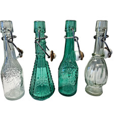 4 Small vintage glass bottles